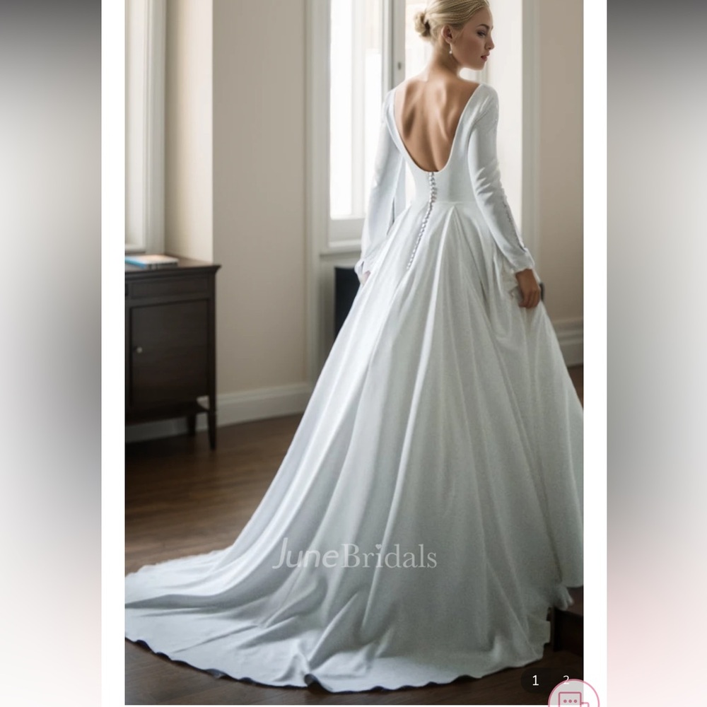 Size 4 never worn ivory June bridal wedding dress